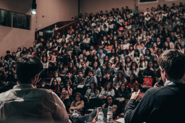 People talking in front of audience